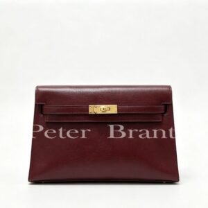 Hermès Kelly Cut Bordeaux Swift Leather Clutch with Gold Hardware