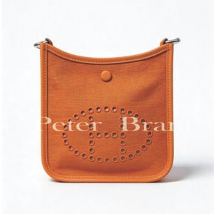Hermès Mini Evelyn 16 Orange Canvas Crossbody Bag with Perforated H Logo - Authentic Luxury Designer Handbag